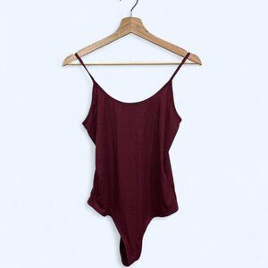 Athleta ribbed burgundy bodysuit, size large. Soft, stretchy, and comfortable wi